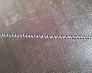 Spring display tube support